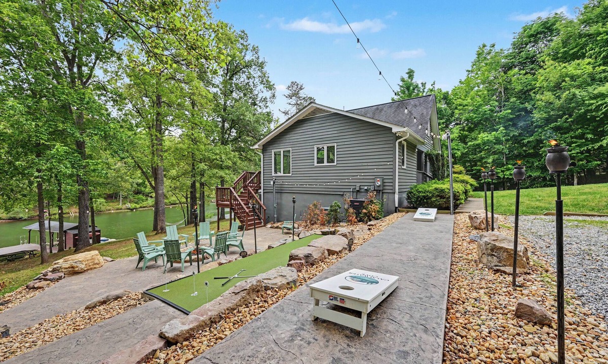 Morgan II House | Spacious waterfront escape with screened porch, water slide, kayak, & games