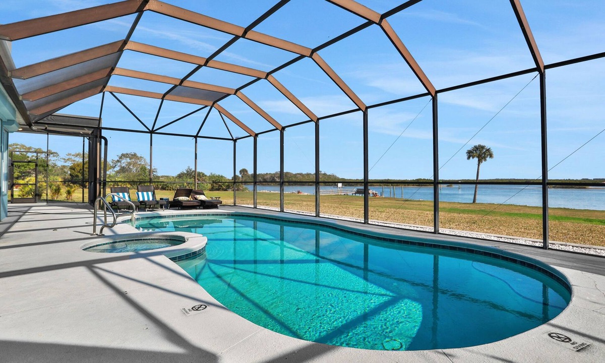 Edgewater House | Sprawling intercoastal home with boat lifts, pool and hot tub