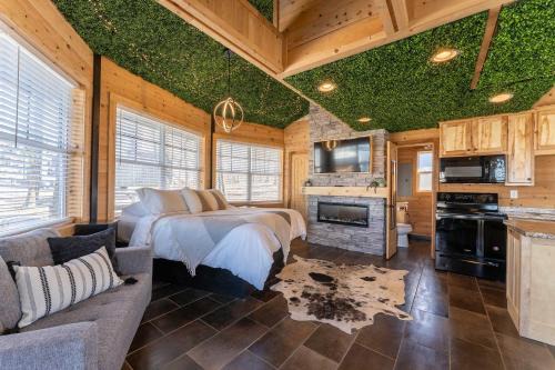 Bryant Apartment | The Yurt at Paradise Pointe with a hot tub fire pit & Grill