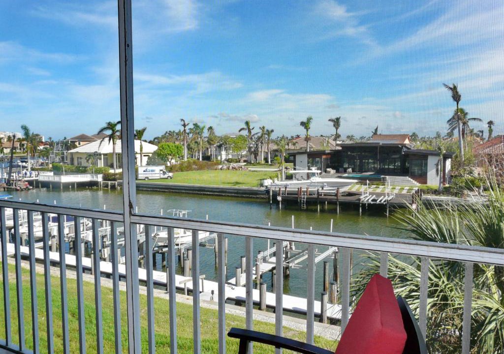 Marco Island Apartment | Tranquil waterfront condo with pool and steps to beach