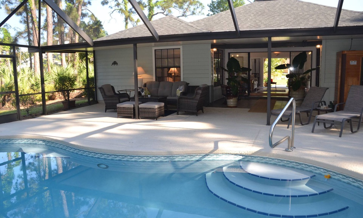 Palm City House | Tropical Paradise! Heated Pool & Sauna. Large very private yard. Near Everything