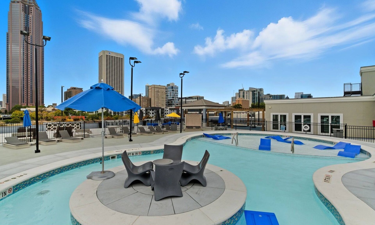 Old Fourth Ward Condo | Two FIFA World Cup Suites · Sleeps 8 · Rooftop Pool · Private Balconies