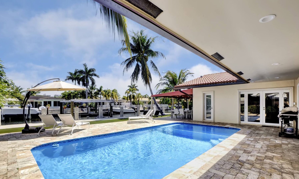 Pompano Isles House | Upscale, luxurious WATERFRONT pool home.