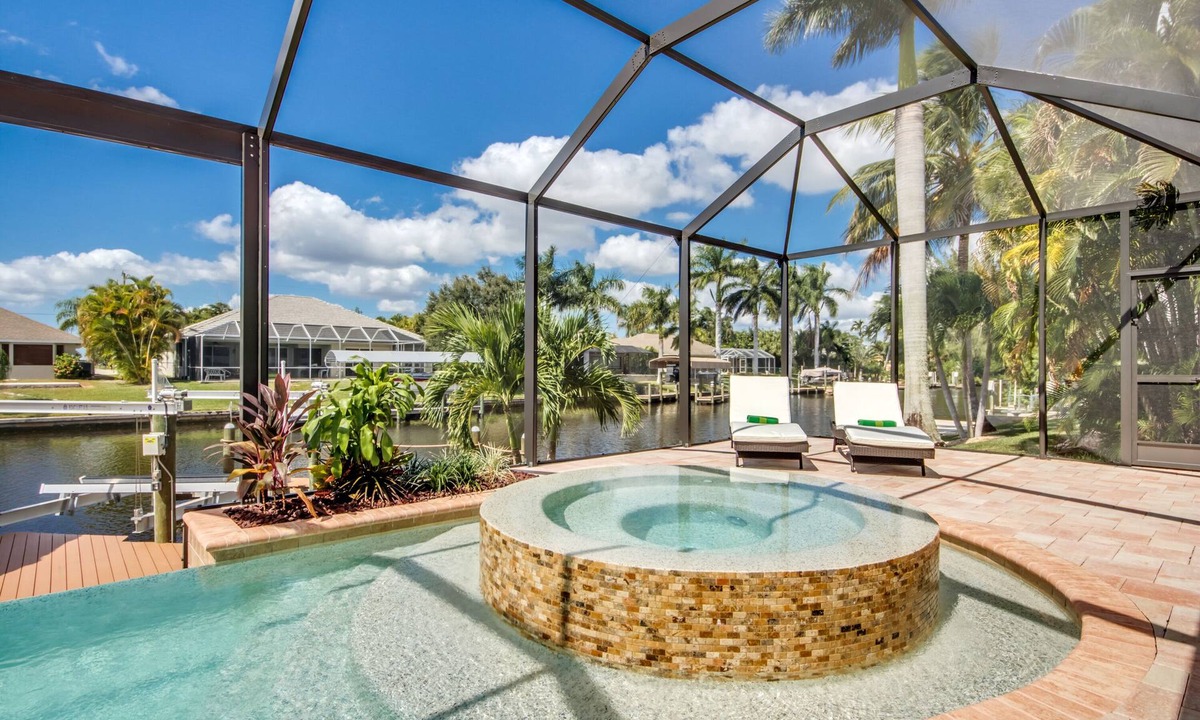 Pelican Villa | Villa 1st Place - luxury villa on the canal with pool, spa and boat lift