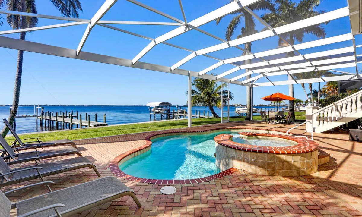 Yacht Club Villa | Villa Bel Air - right on the river - heated pool and spa - sun all day.
