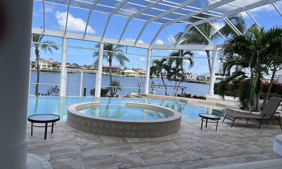 Marco Island House | Waterfront home on Marco Island, large pool, & dock. Sleeps 18, many amenities.