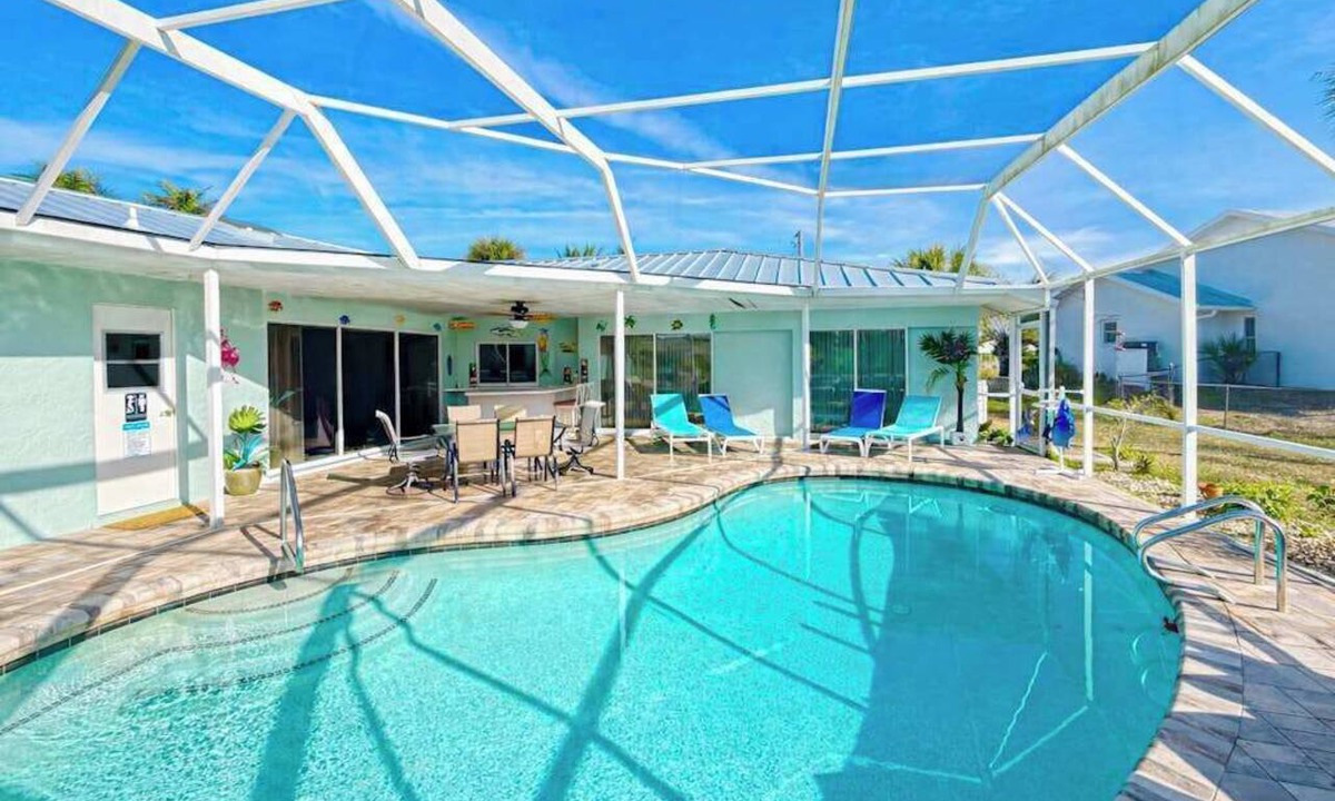 Sorrento Shores House | Waterfront home with pool dock accessible to Gulf with AC & WD