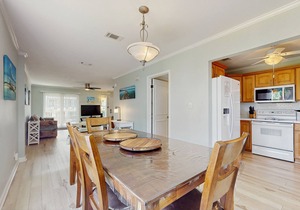 2-story townhouse with 2 balconies & patios, pool access, fast WiFi, AC