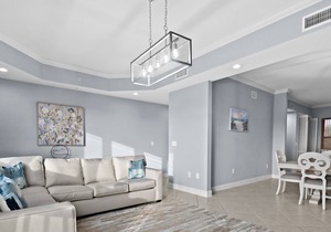 4th-Floor Condo w/Balcony, Partial Gulf Views, A/C, W/D, and Shared Outdoor Pool