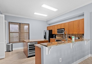 4th-Floor Condo w/Balcony, Partial Gulf Views, A/C, W/D, and Shared Outdoor Pool