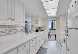 6th Floor End Unit -Bay Side -With Gulf Views and Walk to Vanderbilt Beach!