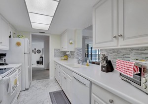 6th Floor End Unit -Bay Side -With Gulf Views and Walk to Vanderbilt Beach!