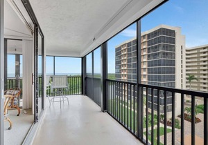 6th Floor End Unit -Bay Side -With Gulf Views and Walk to Vanderbilt Beach!
