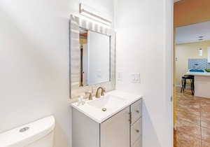 Canal-front condo with pool, boat slip, deck, central AC, & fast WiFi