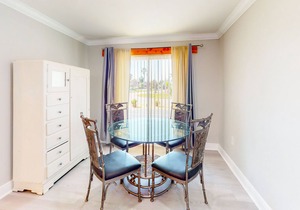 Canal front condo with boat slip, pool access, private deck & fast WiFi