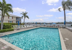 Centrally-located condo near shopping and dining with shared pool and tennis