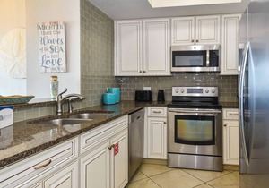 Coastal chic beachfront condo w/updates & private balcony!