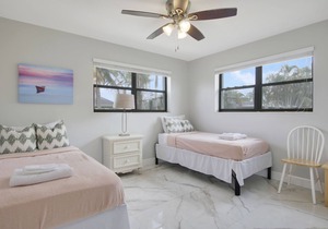 Coastal house in Juno beach with heated saltwater pool. Walk to the local beach.