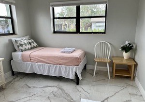 Coastal house in Juno beach with heated saltwater pool. Walk to the local beach.
