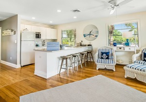 Dog-friendly house w/ beautiful upstairs deck and grill, steps from the beach