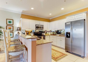 DOG FRIENDLY! Luxurious and professionally decorated townhome across street from beach.