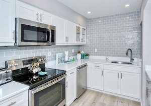 Doveplum 121- 2 Story, 2 Bedroom Condo with Private Beach with lounge chairs & umbrella provided,.