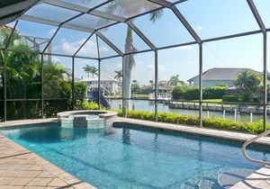 Enchanting waterfront home w/ heated pool, hot tub & boating access