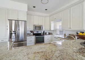 Enjoy Players Club Access in this Luxurious Naples Golf Course Home.