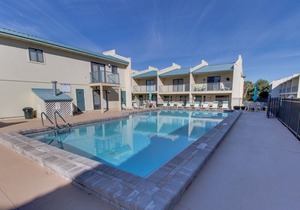 Family-friendly townhouse w/shared pool, partial ocean view, & high-speed WiFi