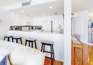 Fifth floor oceanfront condo w/ pool access, ocean view, W/D, WiFi, & central AC
