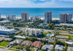 Free Beach Access at this Updated 2 Bed 2 Bath