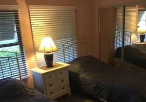 Gated community Ground floor across from pool & hot tub, large corner unit