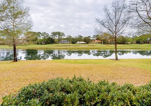 Golf-course home with lake view, central AC, & W/D - near beach