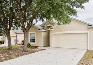 Inviting home near Disney with private pool, patio, gas grill & game area