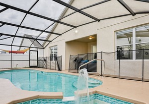 Inviting home near Disney with private pool, patio, gas grill & game area