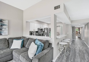 Lakefront ~ Patio ~ Golf Cart ~ Community Pool ~ Modern Living Area