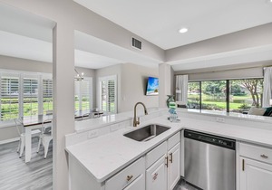 Lakefront ~ Patio ~ Golf Cart ~ Community Pool ~ Modern Living Area