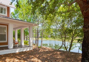 Lakeside Cottage with TWO golf carts! Back Porch, Pool & Hot Tub, Beach Tram.