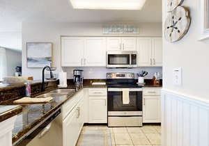 Newly Decorated, Oceanfront Townhouse with Patio, WiFi, W/D & Shared Pool