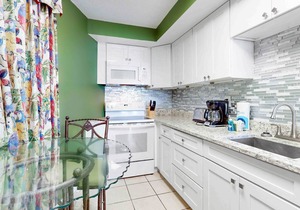 Oceanfront condo with views, beach access, pool, hot tub, game room & gym