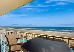 Oceanfront condo with views, beach access, pool, hot tub, game room & gym
