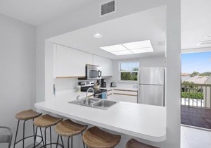Oceangoing condo with pool and steps to beach and food