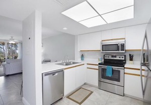 Oceangoing condo with pool and steps to beach and food