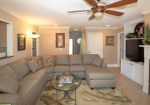 on canal with dock~walk to beach, marina, activity center~screened patio