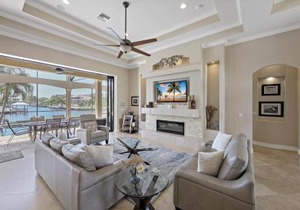 Opulent waterfront home with pool, spa, dock and deck