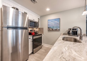 Patio ~ Fully Equipped Kitchen ~ Community Pool ~ Fitness Center