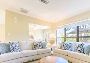 Pet Friendly ~ Golf Cart Included ~ Spacious Living Area ~ Private Patio