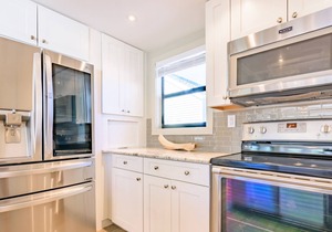 Pet Friendly ~ Golf Cart Included ~ Spacious Living Area ~ Private Patio