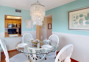 Picture Perfect Views From Every Window! Corner Unit on Sunset Beach in Treasure Island.