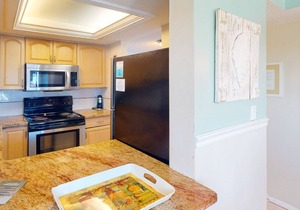 Picture Perfect Views From Every Window! Corner Unit on Sunset Beach in Treasure Island.